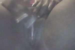 Ebony slut fingering herself passionately in solo movie