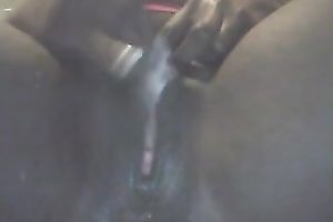 Ebony slut fingering herself passionately in solo movie