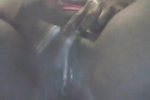 Ebony slut fingering herself passionately in solo movie