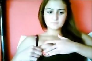 Webcam solo with a ravishing European legal age teenager kneading her nipples