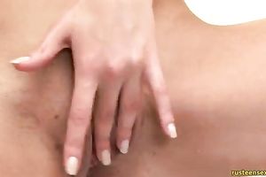 Slim and breasty Russian legal age teenager teases her snatch in the shower room