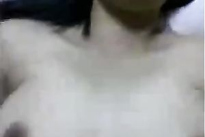 Jerk off on my Indonesian babe's large boobs as I fuck her slit