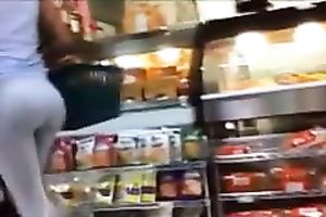 Fitness chick with breathtaking wazoo in yoga panties at the grocery store