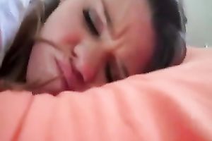 My GF fingers her smooth snatch after getting a facial spunk flow