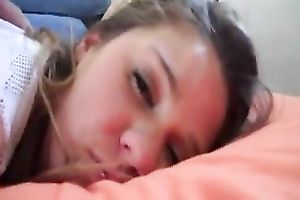 My GF fingers her smooth snatch after getting a facial spunk flow