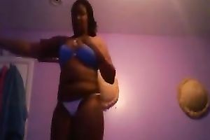 Amateur black skinned black cock slut flashed her large boobies and arse in belts