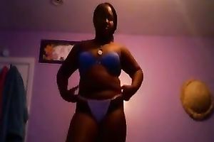 Amateur black skinned black cock slut flashed her large boobies and arse in belts