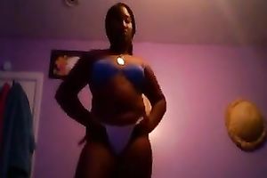 Amateur black skinned black cock slut flashed her large boobies and arse in belts