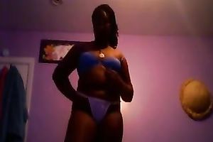 Amateur black skinned black cock slut flashed her large boobies and arse in belts