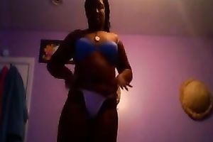 Amateur black skinned black cock slut flashed her large boobies and arse in belts