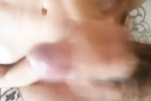 She gives me actually outstanding irrumation and tugjob in sofa