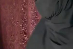 Gorgeous Desi brunette hair in dark hijab flashes her valuable boobies