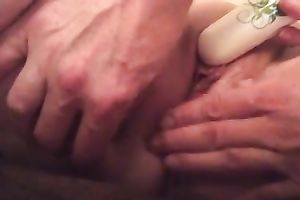 Stretching my wife's love tunnel lips during the time that that babe masturbates with sex toy