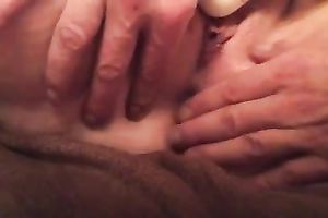 Stretching my wife's love tunnel lips during the time that that babe masturbates with sex toy