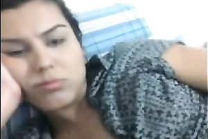 Enchanting dark brown tranny plays with her dong in webcam show