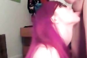 Amateur purple haired girlie in glasses gives deepthroat BJ on livecam