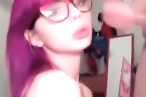 Amateur purple haired girlie in glasses gives deepthroat BJ on livecam
