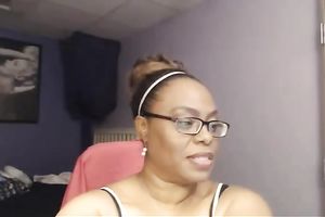 Nerdy web camera dark woman sucked her own saggy massive boobies