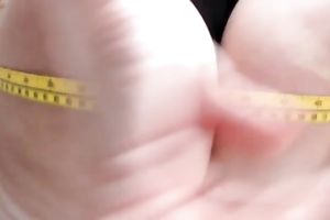 Gorgeous golden-haired housewife measuring her large round ass