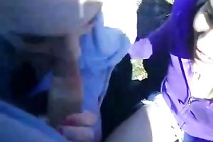 Young and lustful red head gives her boyfriend an outdoor oral