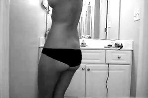 My hawt and skanky dilettante GF stripteases on cam in the bathroom