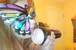Wearing butterfly mask blonde haired cam whore was playing with a toy