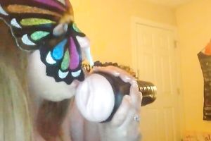 Wearing butterfly mask blonde haired cam whore was playing with a toy