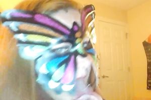 Wearing butterfly mask blonde haired cam whore was playing with a toy
