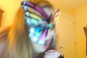 Wearing butterfly mask blonde haired cam whore was playing with a toy