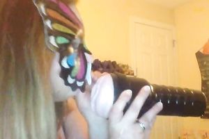 Wearing butterfly mask blonde haired cam whore was playing with a toy