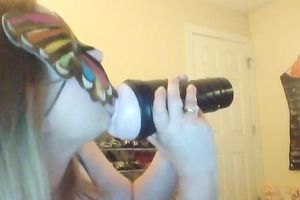 Wearing butterfly mask blonde haired cam whore was playing with a toy