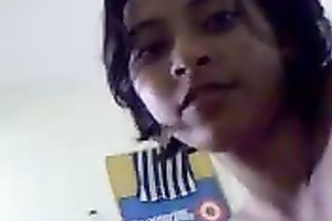 Asian cutie was willing to expose her quite good natural meatballs on camera