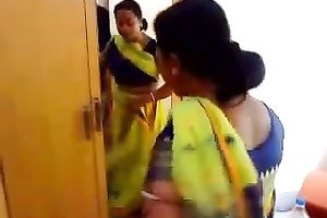 Cute and all natural dark haired Indian sweetheart puts on her sari