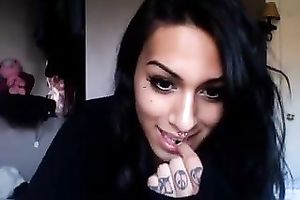 Dark haired nice-looking tranny was playing with her cute pink dildo