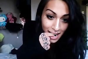 Dark haired nice-looking tranny was playing with her cute pink dildo