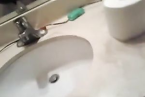 Cute Asian taped herself playing with sextoy in the washroom