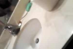 Cute Asian taped herself playing with sextoy in the washroom