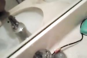 Cute Asian taped herself playing with sextoy in the washroom