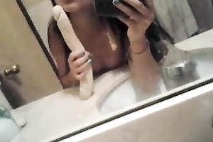 Cute Asian taped herself playing with sextoy in the washroom