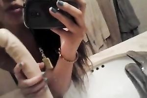 Cute Asian taped herself playing with sextoy in the washroom