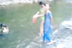 Hot and breasty dilettante teen honey swimming bare in the river