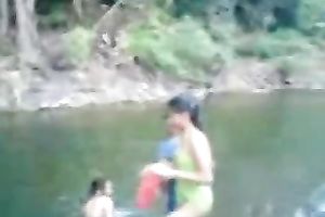 Hot and breasty dilettante teen honey swimming bare in the river