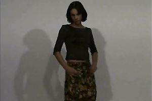 Slender dark brown white wife is stripping on a webcam