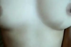 Banging my breasty Asian black cock sluts missionary style and cumming on her abdomen