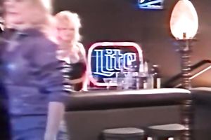 Busty babe got her boobs licked by her lewd girlfriend in the crapper