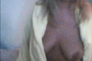 Amateur golden-haired flashes her large natural zeppelins for the cam