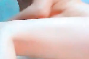 Webcam solo with an non-professional legal age teenager toying her rectal hole