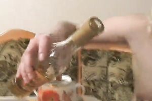 Bosomy blonde haired dyed floozy flashes her boobies at home