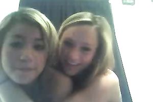 Two cute blonde haired gals flash their large boobies on cam for me