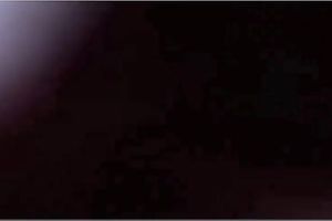 Lubricious dark brown wife riding large fake penis in front of camera